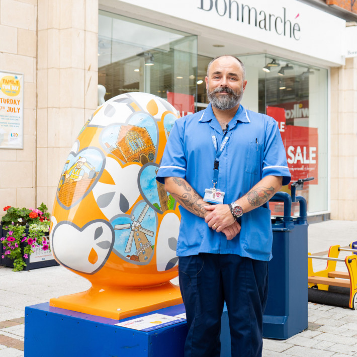 Orange heart with male nurse