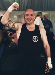 Father has taken on a trained cage fighter in support of St Barnabas and won