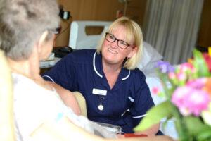 st barnabas team member with patient