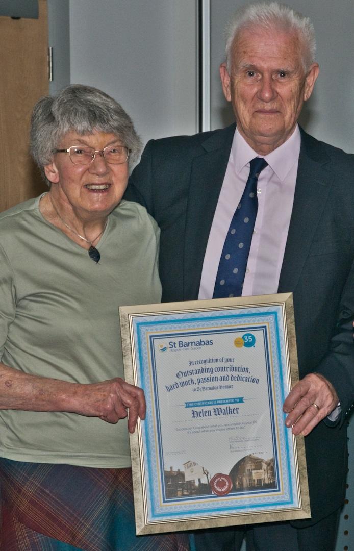 Dr Helen Walker being presented with an award