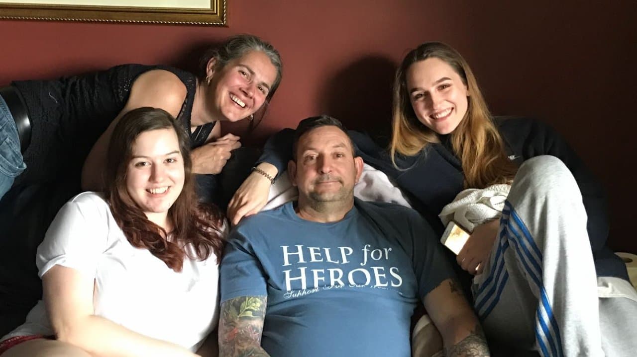Stevie French with her dad and family