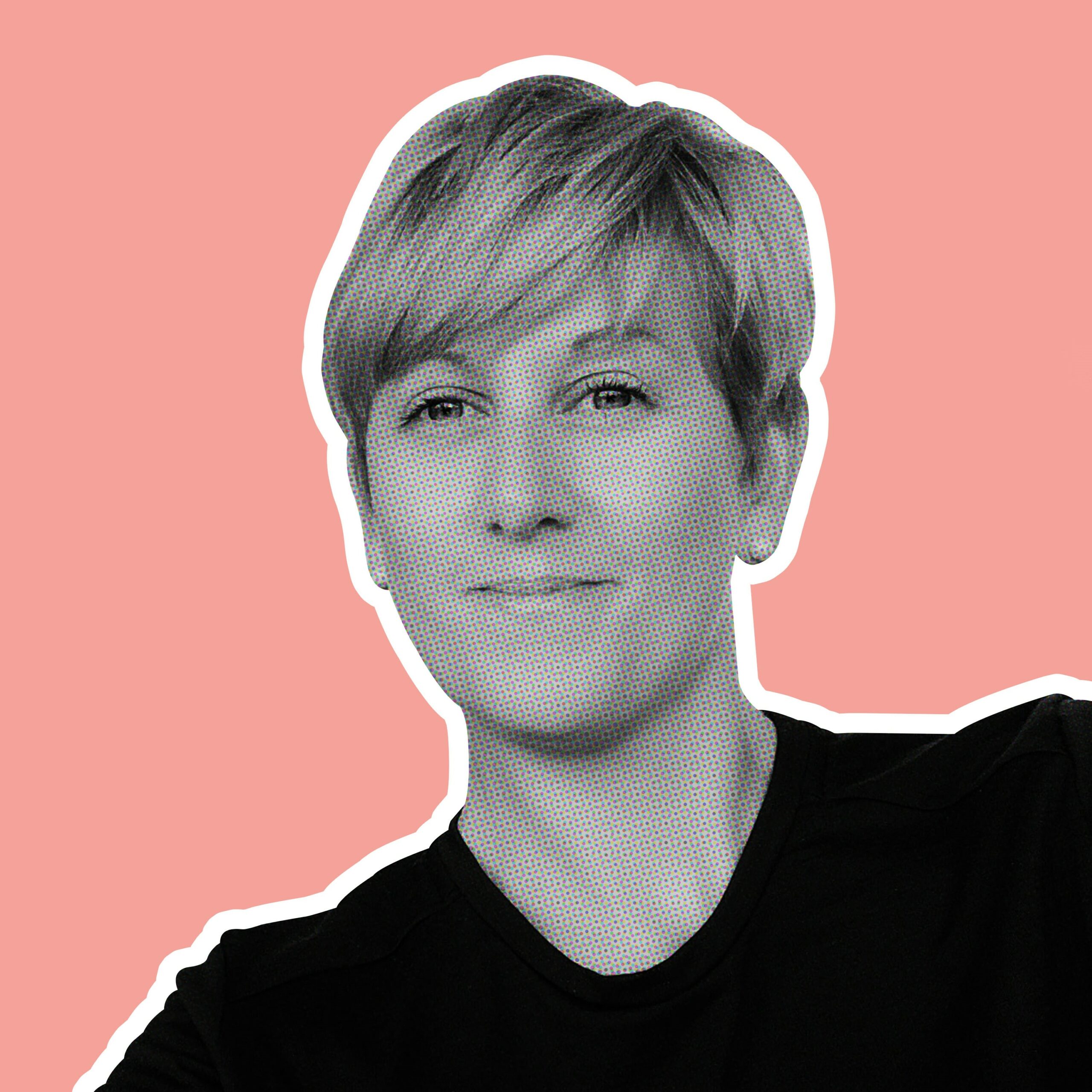 Pip Claffey, one of the Artists for the St Barnabas HeART Trail. Black and white photo of woman with short blonde hair and black top, against pink background.