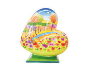 A Heart-shaped sculpture, painted with design depicting the Lincolnshire Wolds. This sculpture is part of the St Barnabas HeART Trail.