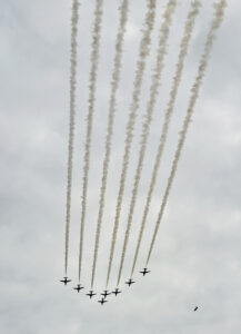 Flyover of Red Arrows, leaving vapour clouds
