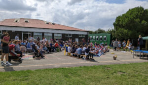 Large group of people sitting watching Dunston's Got Talent performance in aid of St Barnabas.