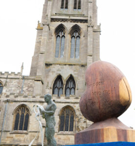 Heart-shaped wooden sculpture outside of St James Church in Louth