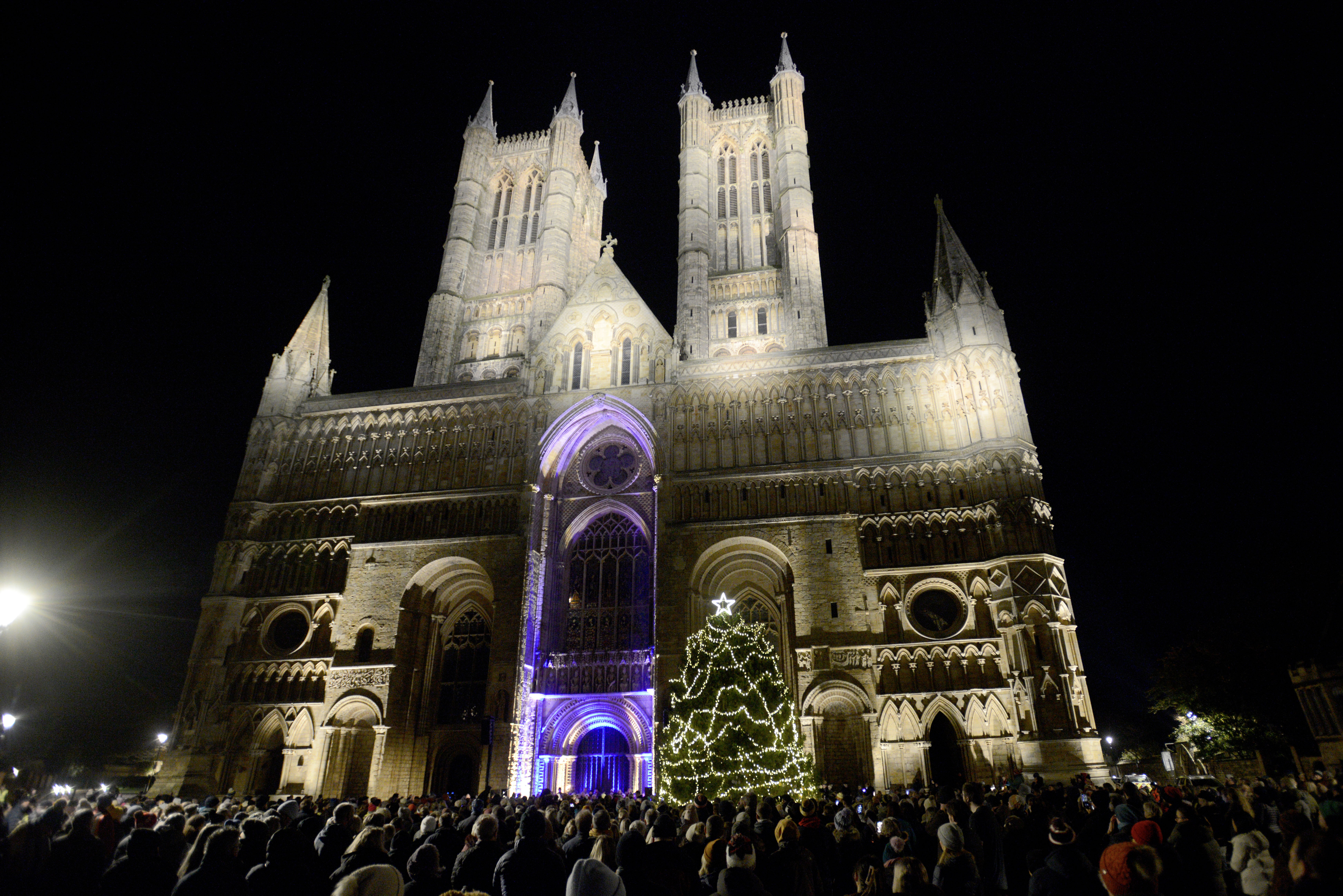 Lincoln cathedral with St Barnabas Tree of Life illuminated