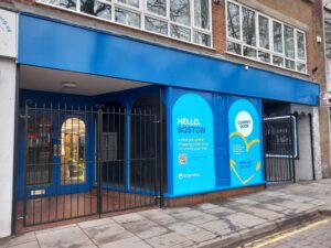 Boston charity shop front with window decals