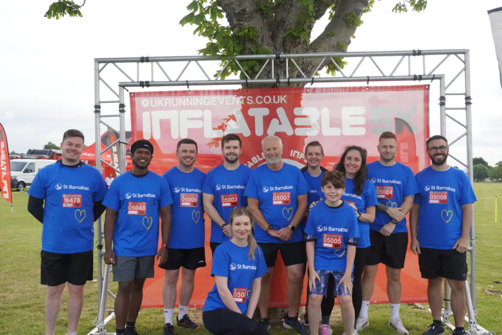 Corporate team doing Inflatable 5k